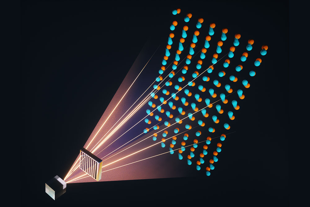 Graphic showing light emanating from a cubic crystal and passing through a material with an array of square holes. A lattice of atoms appears on the other side